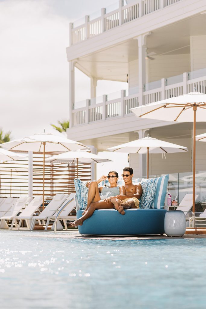 Young couple having fun at a hotel pool Hotel Photography - Shore House at the Del